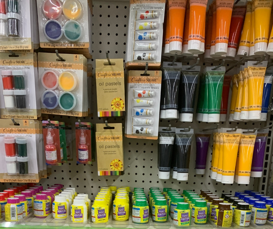 Paint craft supplies on display in a Dollar Tree Store.